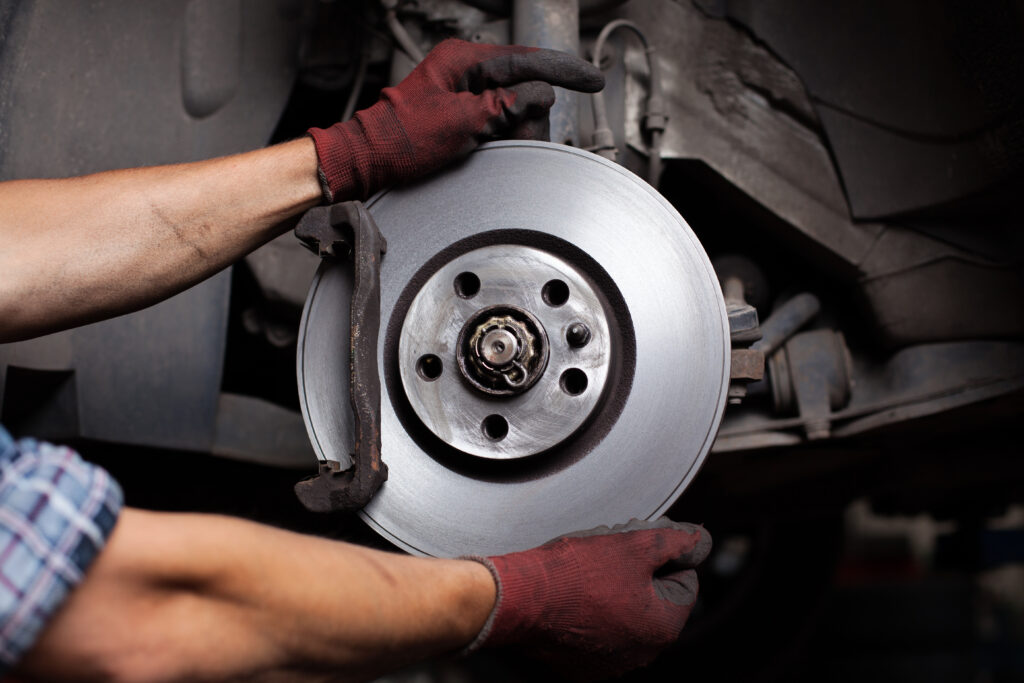 4 Questions To Understand How Brakes Work Car mechanic Repairing brakes on car. brakes work