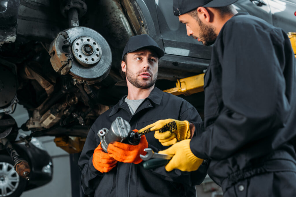 How to Choose the Right Mechanic
Auto mechanics working with car and tools in workshop
